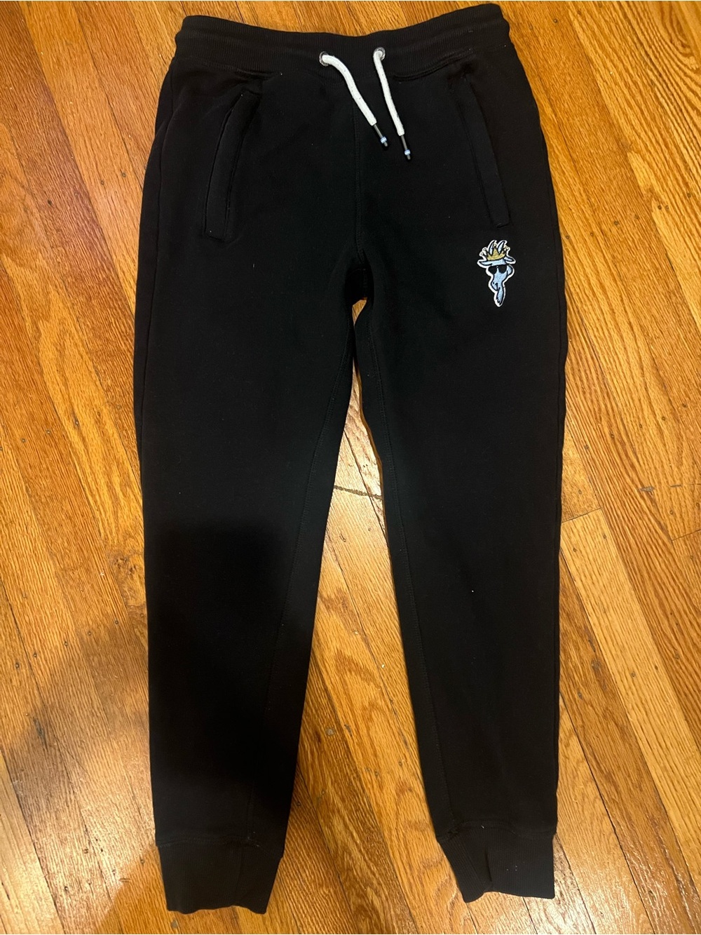 Kids Black Fleece Joggers with Embroidered Torch Detail